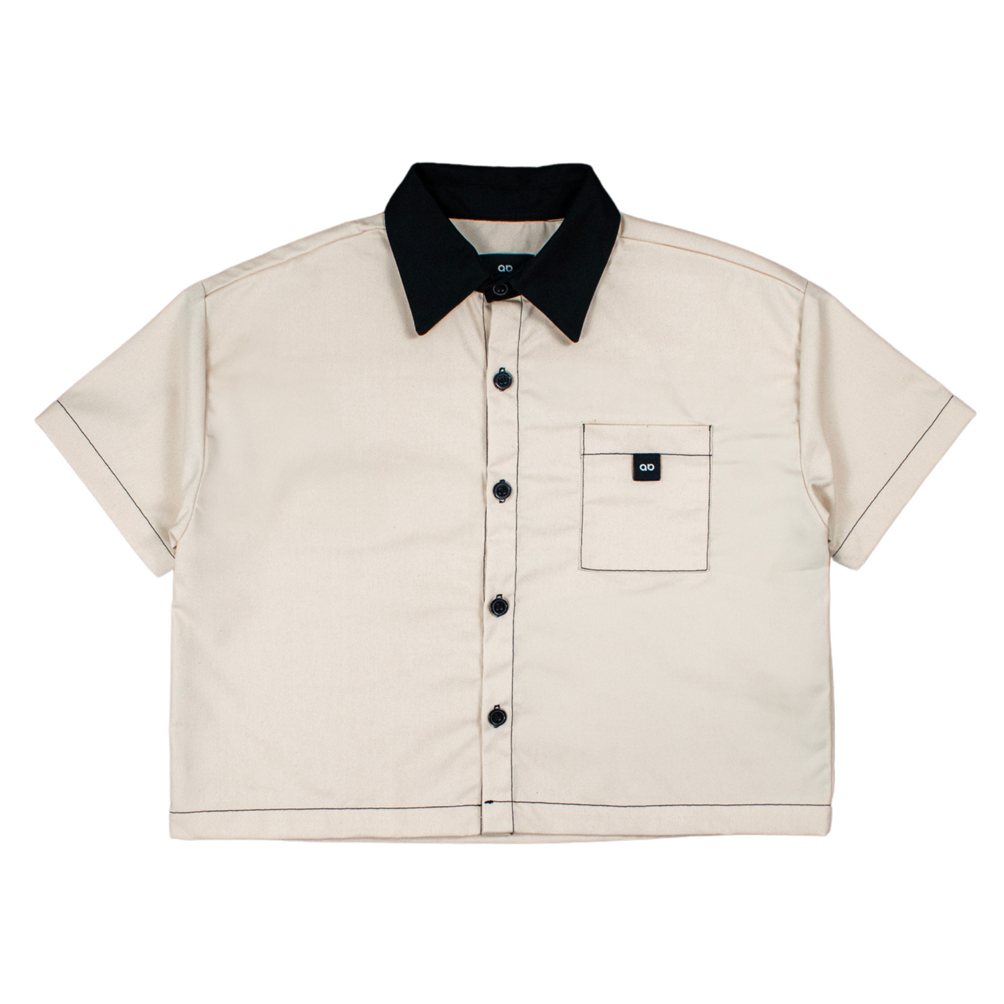 cropped polo shirt | button-down | drop shoulder | dual-tone and box fit | classic twill | crème