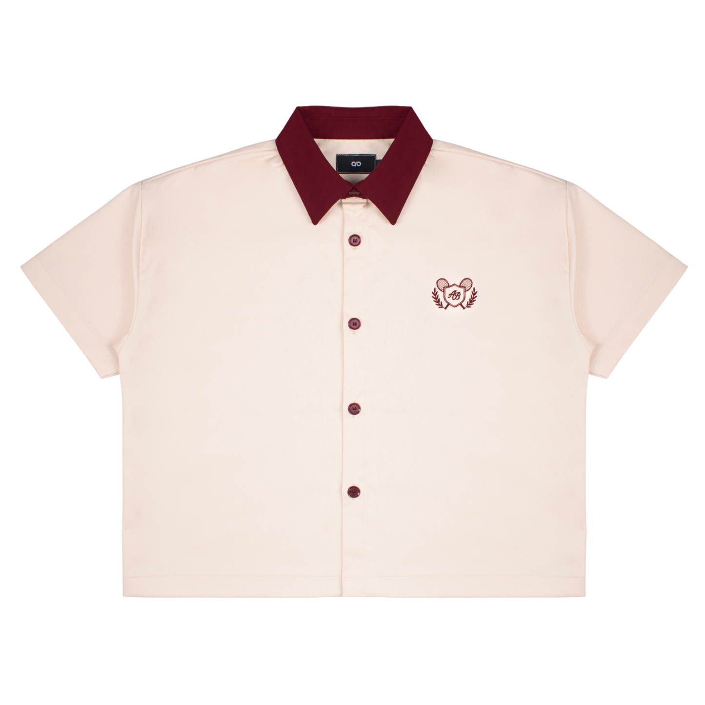 boxy polo shirt | athletics club in crème & rosewood