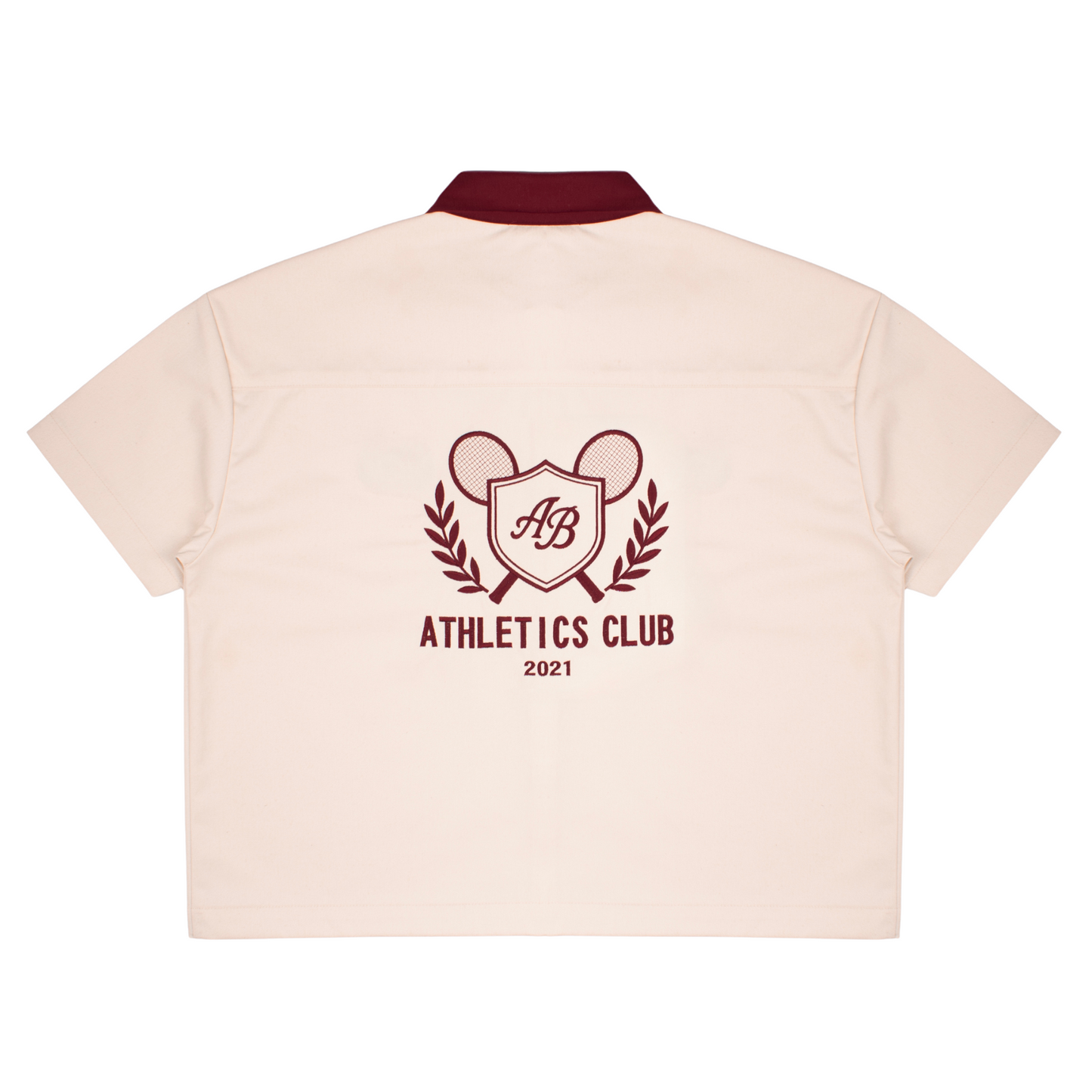 boxy polo shirt | athletics club in crème & rosewood