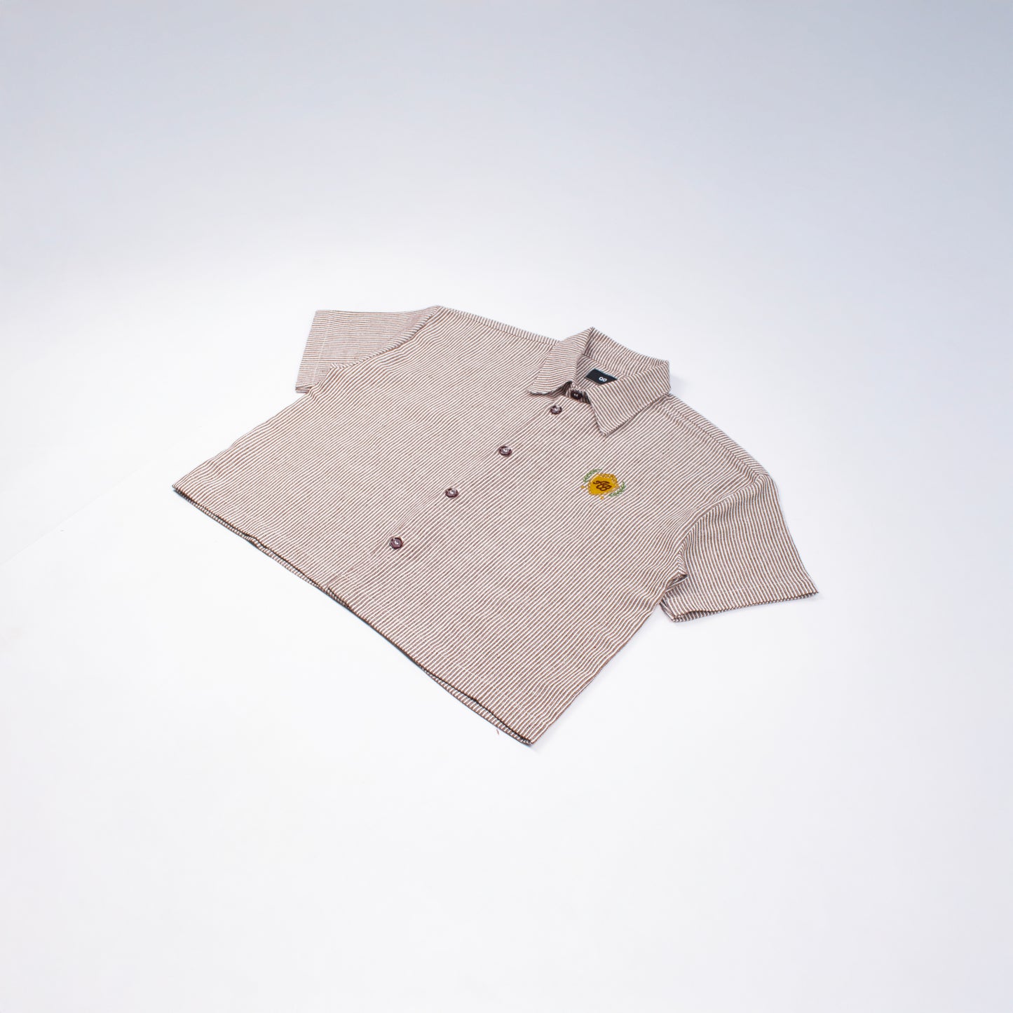 boxy cropped polo shirt | athletics club in umber stripes