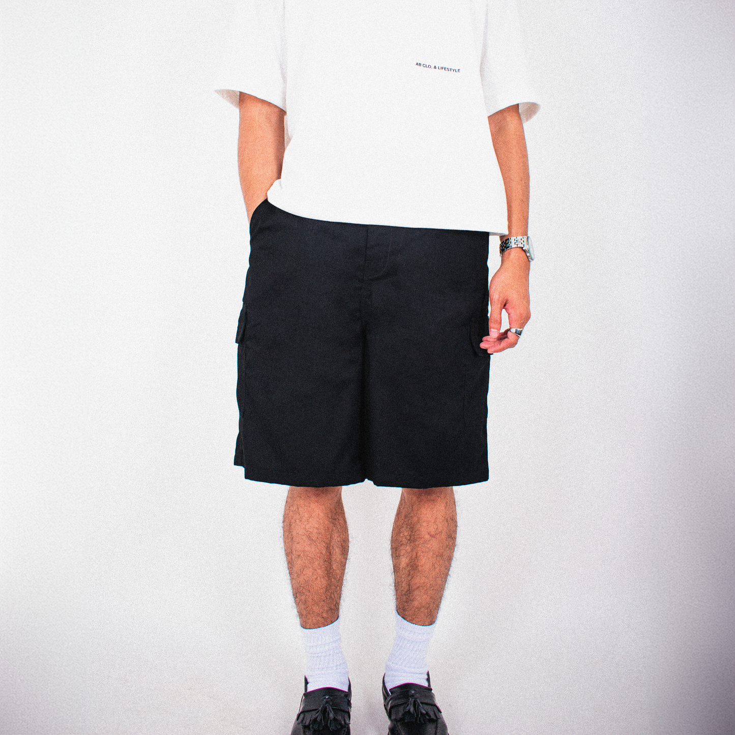 long shorts | hybrid belt-loop | below-knee | black