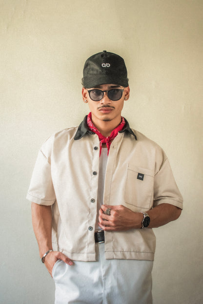 cropped polo shirt | button-down | drop shoulder | dual-tone and box fit | classic twill | oat milk