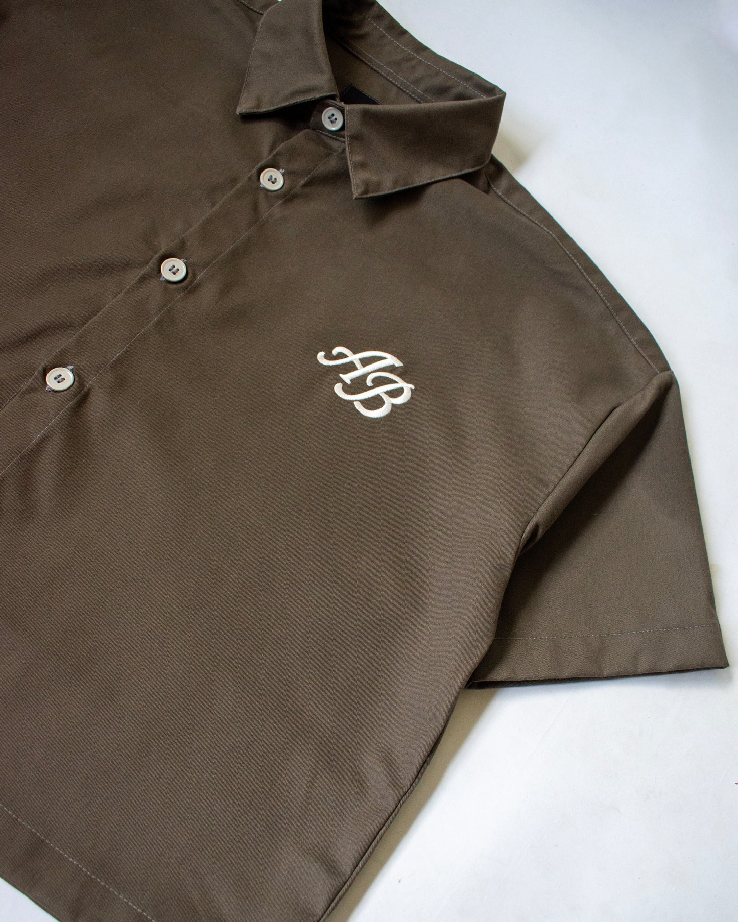 boxy cropped polo shirt | earth