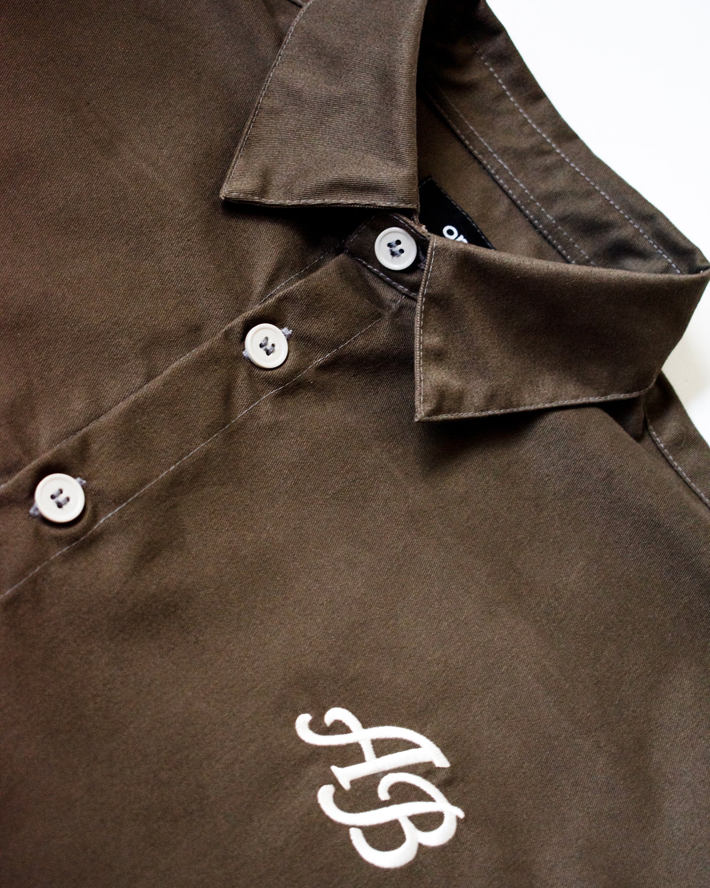 boxy cropped polo shirt | earth