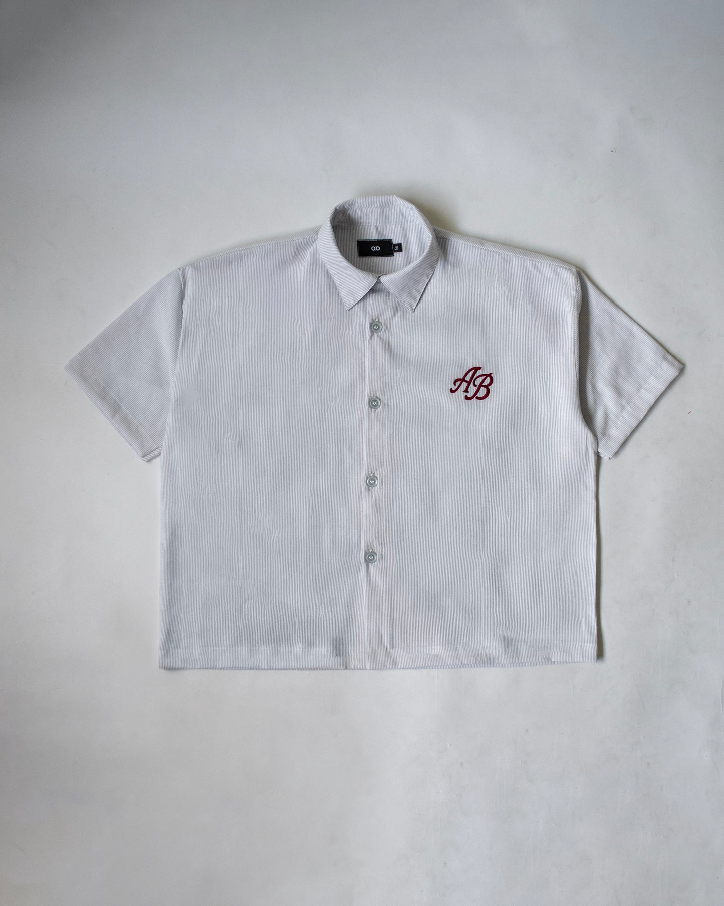 boxy polo shirt | athletics club in snow