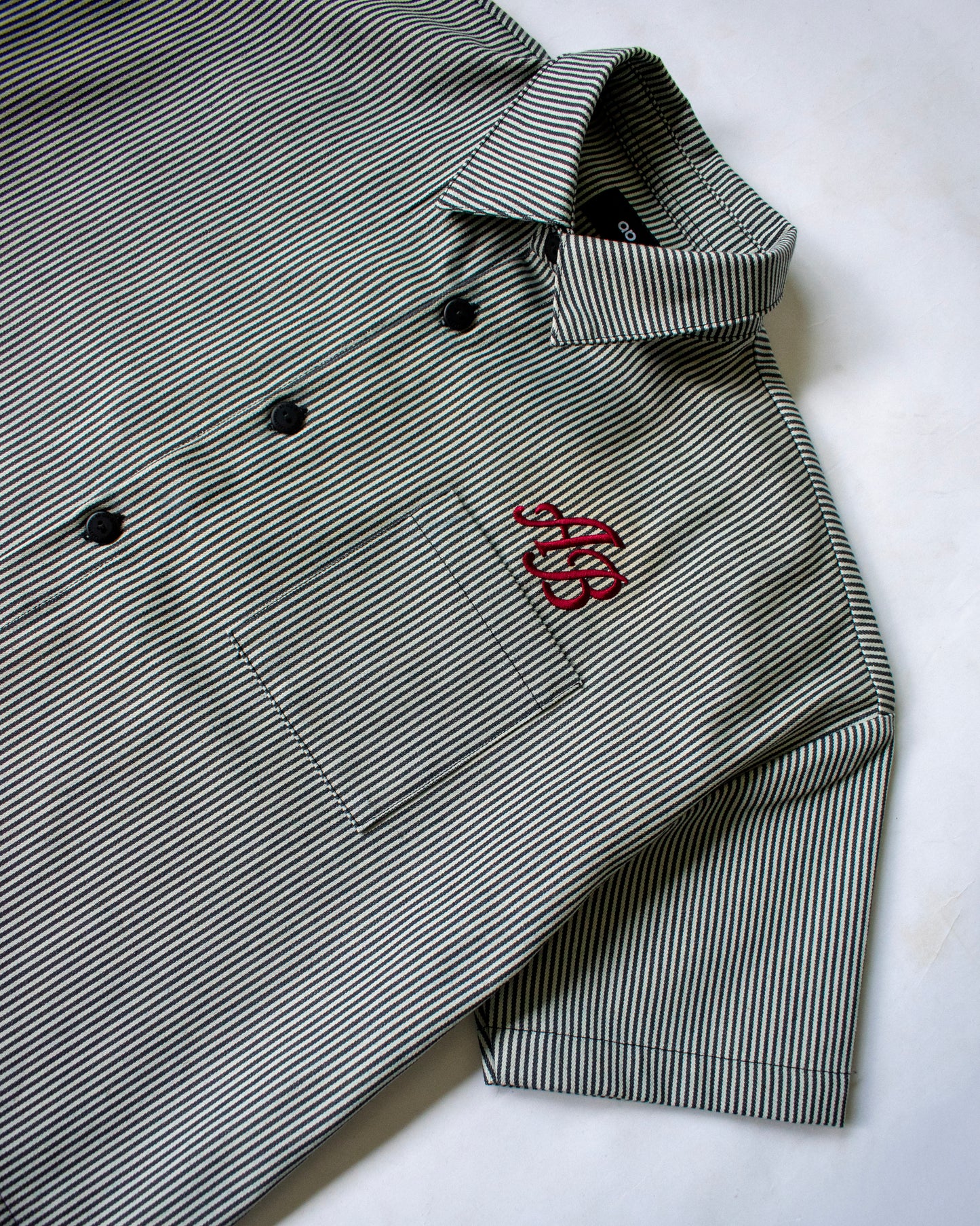 boxy cropped athlete's polo shirt | ash stripes